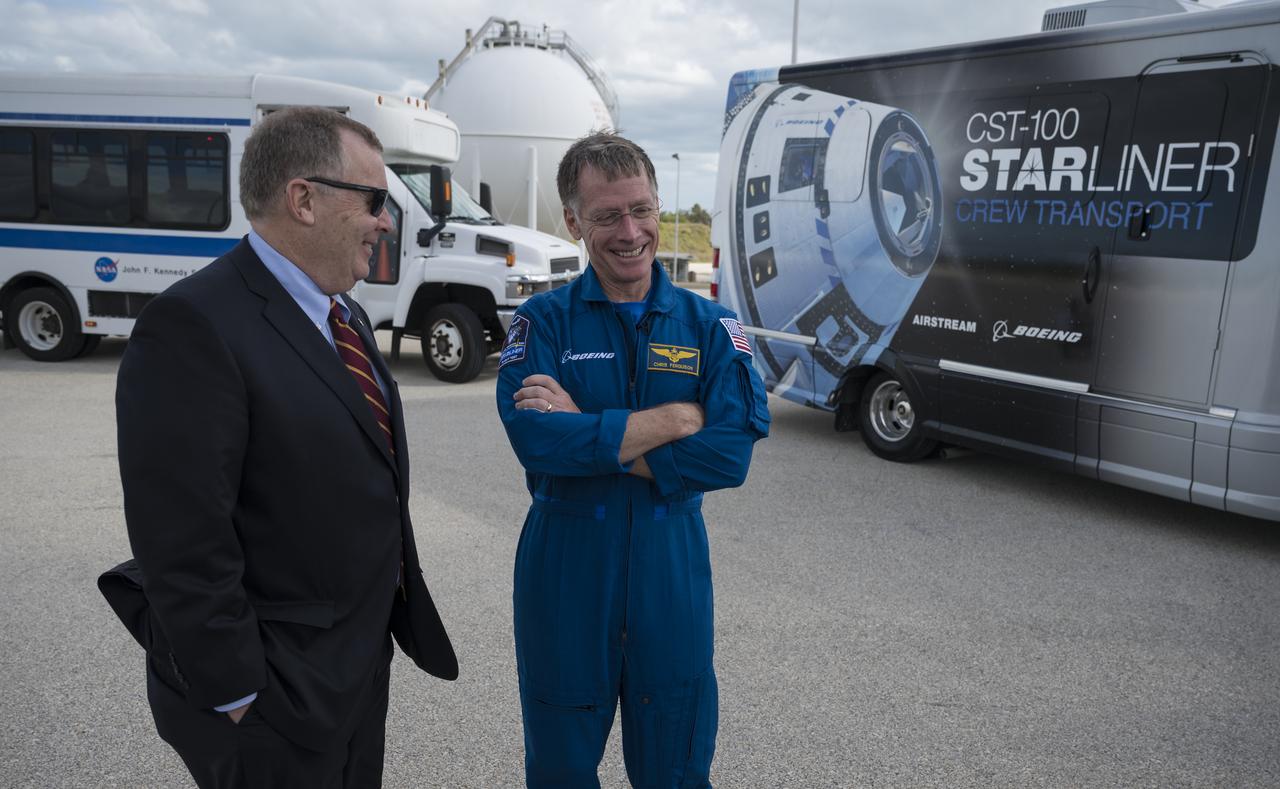 NASA Deputy Administrator Jim Morhard speaks with Boeing astronaut Chris Ferguson at Space Launch Complex 41 ahead of Boeing’s Orbital Flight Test mission, Thursday, Dec. 19, 2019, at Cape Canaveral Air Force Station in Florida. The uncrewed Orbital Flight Test will be Starliner’s maiden mission to the International Space Station for NASA's Commercial Crew Program. The mission, currently targeted for a 6:36 a.m. EST launch on Dec. 20, will serve as an end-to-end test of the system's capabilities. Photo Credit: (NASA/Joel Kowsky)