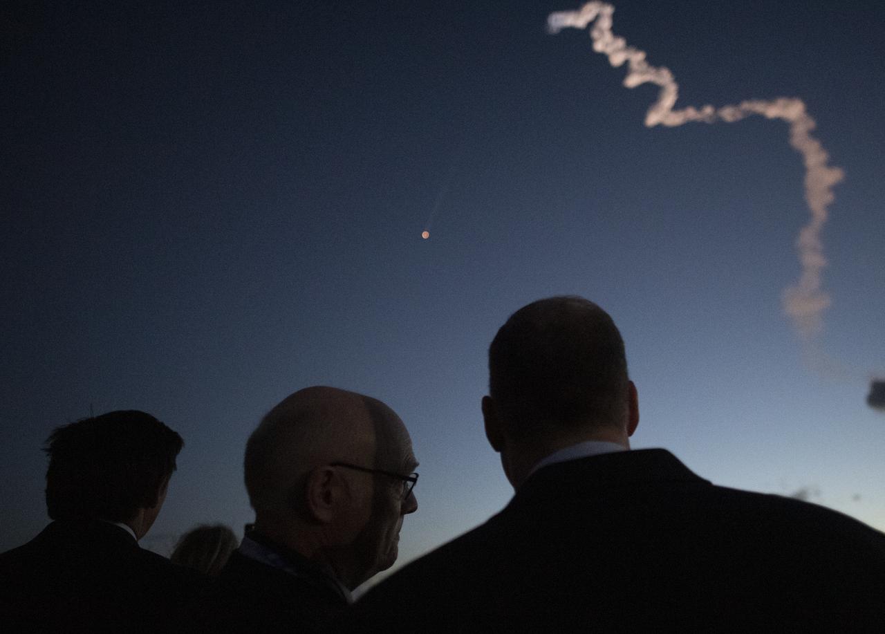 Florida Gov. Ron DeSantis (R), left, Tory Bruno, president and CEO of United Launch Alliance, and NASA Administrator Jim Bridenstine watch as a United Launch Alliance Atlas V rocket with Boeing’s CST-100 Starliner spacecraft onbaord launches from Space Launch Complex 41 at Cape Canaveral Air Force Station, Friday, Dec. 20, 2019, from NASA’s Kennedy Space Center in Florida. The uncrewed Orbital Flight Test launched at 6:36 a.m. EST and is Starliner’s maiden mission to the International Space Station for NASA's Commercial Crew Program. The mission will serve as an end-to-end test of the system's capabilities. Photo Credit: (NASA/Joel Kowsky)