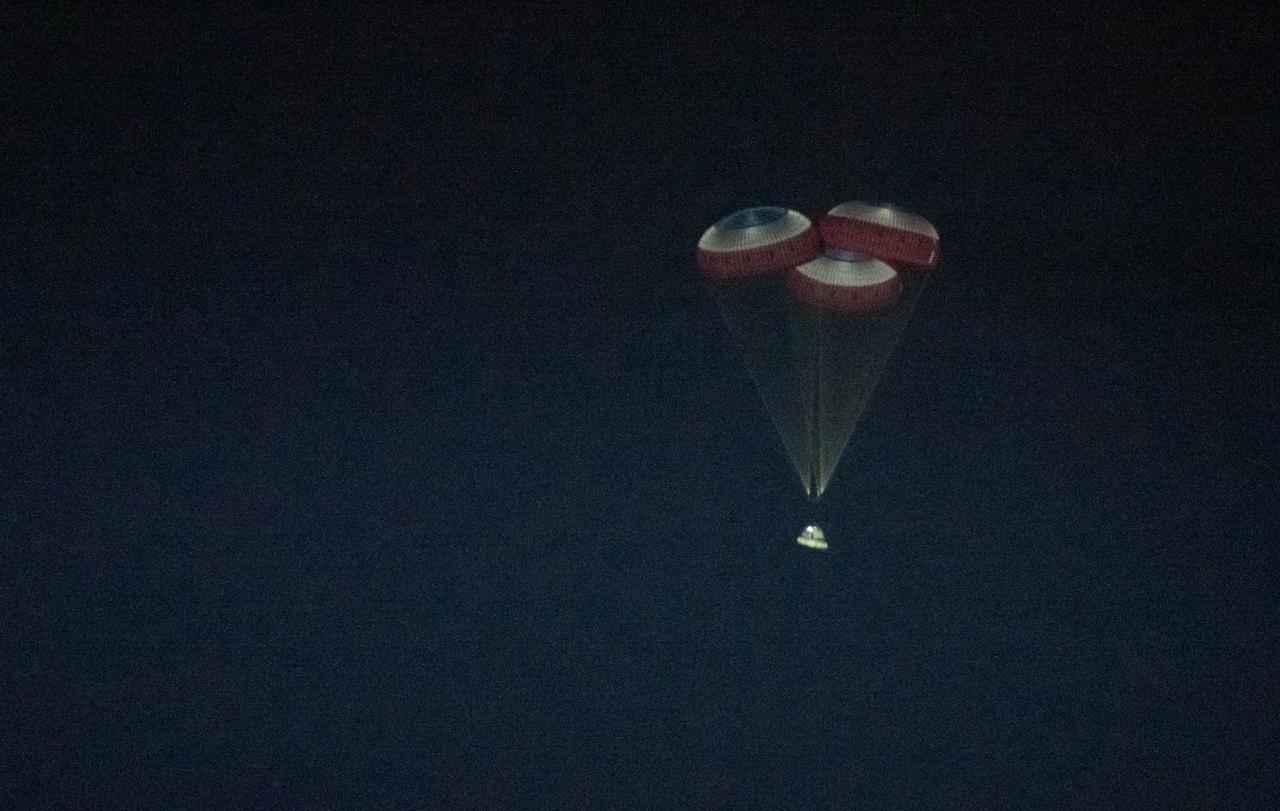 The Boeing CST-100 Starliner spacecraft is seen with landing support inflated as it lands in White Sands, New Mexico, Sunday, Dec. 22, 2019. The landing completes an abbreviated Orbital Flight Test for the company that still meets several mission objectives for NASA’s Commercial Crew program. The Starliner spacecraft launched on a United Launch Alliance Atlas V rocket at 6:36 a.m. Friday, Dec. 20 from Space Launch Complex 41 at Cape Canaveral Air Force Station in Florida. Photo Credit: (NASA/Aubrey Gemignani)