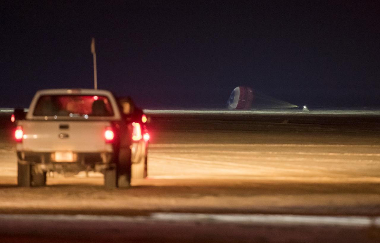 The Boeing CST-100 Starliner spacecraft lands in White Sands, New Mexico, Sunday, Dec. 22, 2019. The landing completes an abbreviated Orbital Flight Test for the company that still meets several mission objectives for NASA’s Commercial Crew program. The Starliner spacecraft launched on a United Launch Alliance Atlas V rocket at 6:36 a.m. Friday, Dec. 20 from Space Launch Complex 41 at Cape Canaveral Air Force Station in Florida. Photo Credit: (NASA/Aubrey Gemignani)