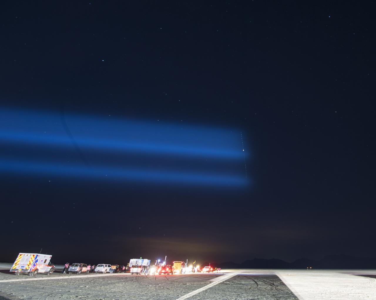 The Boeing CST-100 Starliner spacecraft is seen landing in this 30 sec. exposure in White Sands, New Mexico, Sunday, Dec. 22, 2019. The landing completes an abbreviated Orbital Flight Test for the company that still meets several mission objectives for NASA’s Commercial Crew program. The Starliner spacecraft launched on a United Launch Alliance Atlas V rocket at 6:36 a.m. Friday, Dec. 20 from Space Launch Complex 41 at Cape Canaveral Air Force Station in Florida. Photo Credit: (NASA/Aubrey Gemignani)