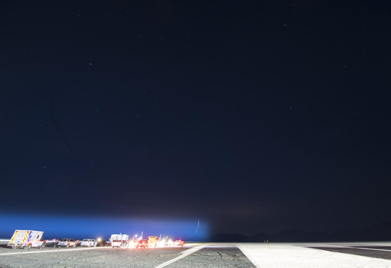 The Boeing CST-100 Starliner spacecraft is seen landing in this 30 sec. exposure in White Sands, New Mexico, Sunday, Dec. 22, 2019. The landing completes an abbreviated Orbital Flight Test for the company that still meets several mission objectives for NASA’s Commercial Crew program. The Starliner spacecraft launched on a United Launch Alliance Atlas V rocket at 6:36 a.m. Friday, Dec. 20 from Space Launch Complex 41 at Cape Canaveral Air Force Station in Florida. Photo Credit: (NASA/Aubrey Gemignani)