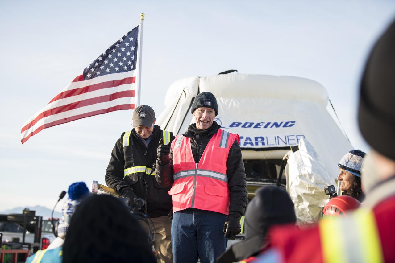 Former NASA astronaut and test flight pilot for the first manned flight of the Boeing CST-100 Starliner spacecraft, Chris Ferguson, speaks after the capsule landed in White Sands, New Mexico, Sunday, Dec. 22, 2019. The landing completes an abbreviated Orbital Flight Test for the company that still meets several mission objectives for NASA’s Commercial Crew program. The Starliner spacecraft launched on a United Launch Alliance Atlas V rocket at 6:36 a.m. Friday, Dec. 20 from Space Launch Complex 41 at Cape Canaveral Air Force Station in Florida. Photo Credit: (NASA/Aubrey Gemignani)