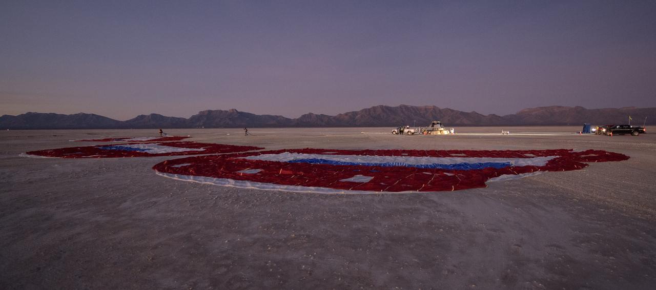 Boeing, NASA, and U.S. Army personnel work around the Boeing CST-100 Starliner spacecraft shortly after it landed in White Sands, New Mexico, Sunday, Dec. 22, 2019. The landing completes an abbreviated Orbital Flight Test for the company that still meets several mission objectives for NASA’s Commercial Crew program. The Starliner spacecraft launched on a United Launch Alliance Atlas V rocket at 6:36 a.m. Friday, Dec. 20 from Space Launch Complex 41 at Cape Canaveral Air Force Station in Florida. Photo Credit: (NASA/Bill Ingalls)