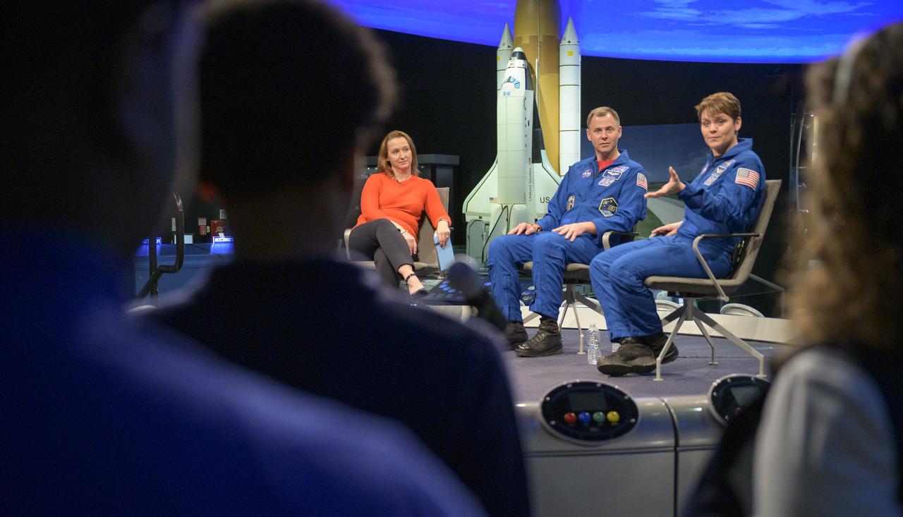 NASA astronauts Nick Hague and Anne McClain talk about their experiences onboard the International Space Station with Smithsonian National Air and Space Museum curator Jennifer Levasseu, Tuesday, Jan. 14, 2020, at the Smithsonian National Air and Space Museum in Washington. Hague most recently spent 203 days living and working onboard the International Space Station as part of Expeditions 59 and 60. McClain most recently spent 204 days living and working onboard the International Space Station as part of Expeditions 58 and 59. Photo Credit: (NASA/Bill Ingalls)