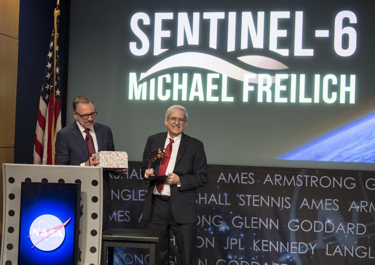 ESA (European Space Agency) director of Earth Observation Programmes, Josef Aschbacher, left, presents NASA’s former director of the Earth Science division, Dr. Michael Freilich with an award after announcing that  the international ocean science satellite previously known as Sentinel-6A/Jason-CS has been renamed Sentinel-6 Michael Freilich after him, Tuesday, January 28, 2020, at NASA Headquarters in Washington. Sentinel-6A Michael Freilich will observe and record global sea level changes and will be joined by an identical satellite slated to launch in 2025 for a total of ten years of targeted observations.  Photo Credit: (NASA/Aubrey Gemignani)