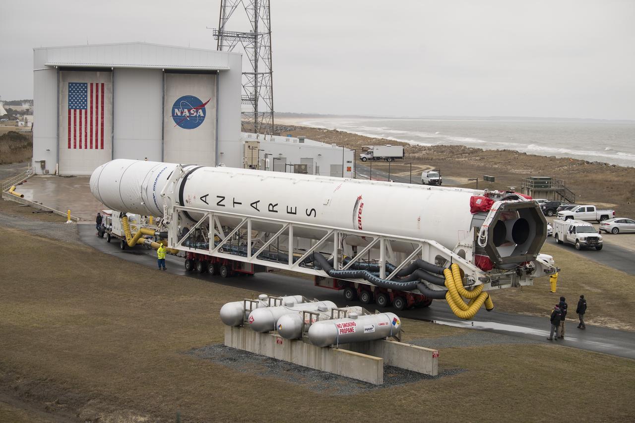 A Northrop Grumman Antares rocket is rolled out to Pad-0A, Wednesday, Feb. 5, 2020, at NASA's Wallops Flight Facility in Virginia. Northrop Grumman’s 13th contracted cargo resupply mission with NASA to the International Space Station will deliver more than 7,500 pounds of science and research, crew supplies and vehicle hardware to the orbital laboratory and its crew. The CRS-13 Cygnus spacecraft is named after the first African American astronaut, Major Robert Henry Lawrence Jr. and is scheduled to launch at 5:39pm EST Sunday, Feb. 9. Photo Credit: (NASA/Aubrey Gemignani)