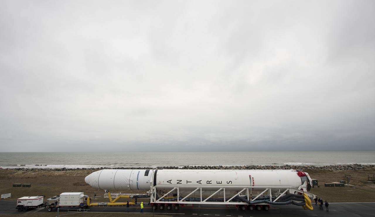 A Northrop Grumman Antares rocket is rolled out to Pad-0A, Wednesday, Feb. 5, 2020, at NASA's Wallops Flight Facility in Virginia. Northrop Grumman’s 13th contracted cargo resupply mission with NASA to the International Space Station will deliver more than 7,500 pounds of science and research, crew supplies and vehicle hardware to the orbital laboratory and its crew. The CRS-13 Cygnus spacecraft is named after the first African American astronaut, Major Robert Henry Lawrence Jr. and is scheduled to launch at 5:39pm EST Sunday, Feb. 9. Photo Credit: (NASA/Aubrey Gemignani)