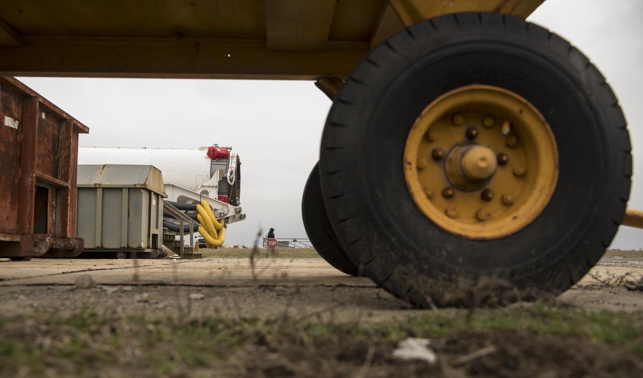 A Northrop Grumman Antares rocket is rolled out to Pad-0A, Wednesday, Feb. 5, 2020, at NASA's Wallops Flight Facility in Virginia. Northrop Grumman’s 13th contracted cargo resupply mission with NASA to the International Space Station will deliver more than 7,500 pounds of science and research, crew supplies and vehicle hardware to the orbital laboratory and its crew. The CRS-13 Cygnus spacecraft is named after the first African American astronaut, Major Robert Henry Lawrence Jr. and is scheduled to launch at 5:39pm EST Sunday, Feb. 9. Photo Credit: (NASA/Aubrey Gemignani)