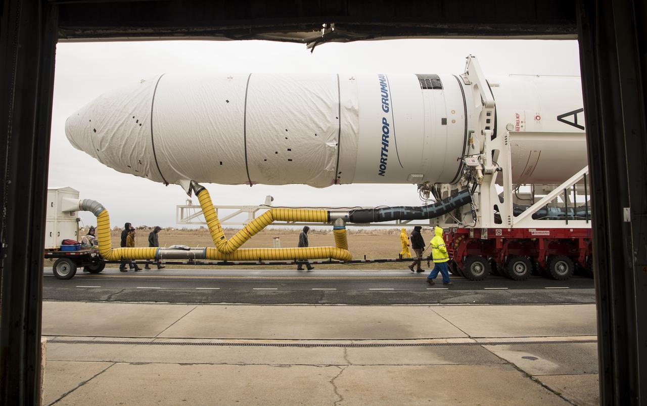A Northrop Grumman Antares rocket is rolled out to Pad-0A, Wednesday, Feb. 5, 2020, at NASA's Wallops Flight Facility in Virginia. Northrop Grumman’s 13th contracted cargo resupply mission with NASA to the International Space Station will deliver more than 7,500 pounds of science and research, crew supplies and vehicle hardware to the orbital laboratory and its crew. The CRS-13 Cygnus spacecraft is named after the first African American astronaut, Major Robert Henry Lawrence Jr. and is scheduled to launch at 5:39pm EST Sunday, Feb. 9. Photo Credit: (NASA/Aubrey Gemignani)
