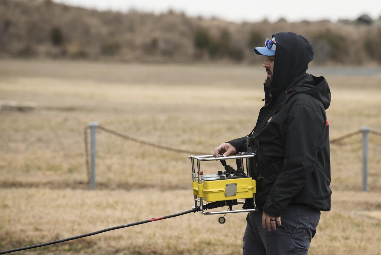 Dustin Woodhurst guides the Northrop Grumman Antares rocket to Pad-0A using a remote control, Wednesday, Feb. 5, 2020, at NASA's Wallops Flight Facility in Virginia. Northrop Grumman’s 13th contracted cargo resupply mission with NASA to the International Space Station will deliver more than 7,500 pounds of science and research, crew supplies and vehicle hardware to the orbital laboratory and its crew. The CRS-13 Cygnus spacecraft is named after the first African American astronaut, Major Robert Henry Lawrence Jr. and is scheduled to launch at 5:39pm EST Sunday, Feb. 9. Photo Credit: (NASA/Aubrey Gemignani)