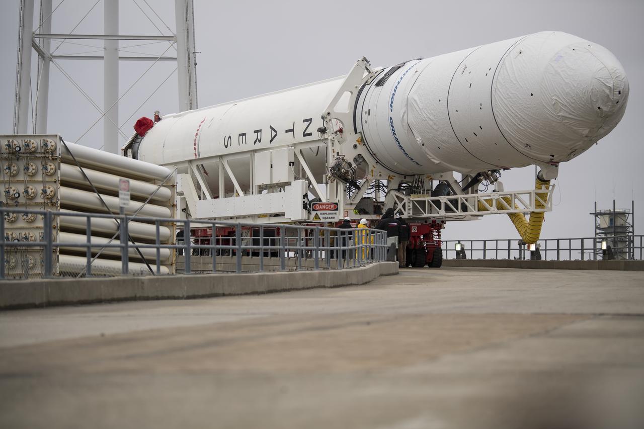 A Northrop Grumman Antares rocket arrives at launch Pad-0A, Wednesday, Feb. 5, 2020, at NASA's Wallops Flight Facility in Virginia. Northrop Grumman’s 13th contracted cargo resupply mission with NASA to the International Space Station will deliver more than 7,500 pounds of science and research, crew supplies and vehicle hardware to the orbital laboratory and its crew. The CRS-13 Cygnus spacecraft is named after the first African American astronaut, Major Robert Henry Lawrence Jr., and is scheduled to launch at 5:39pm EST Sunday, Feb. 9. Photo Credit: (NASA/Aubrey Gemignani)