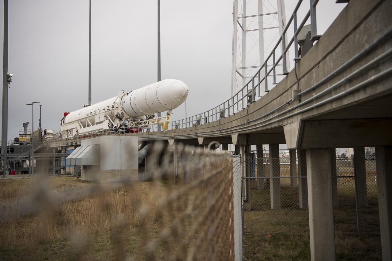 A Northrop Grumman Antares rocket arrives at launch Pad-0A, Wednesday, Feb. 5, 2020, at NASA's Wallops Flight Facility in Virginia. Northrop Grumman’s 13th contracted cargo resupply mission with NASA to the International Space Station will deliver more than 7,500 pounds of science and research, crew supplies and vehicle hardware to the orbital laboratory and its crew. The CRS-13 Cygnus spacecraft is named after the first African American astronaut, Major Robert Henry Lawrence Jr., and is scheduled to launch at 5:39pm EST Sunday, Feb. 9. Photo Credit: (NASA/Aubrey Gemignani)