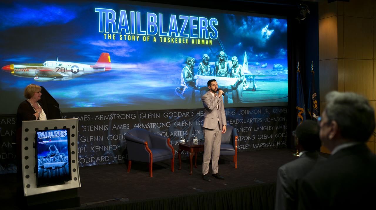 NASA digital content strategist Andres Almeida sings the National Anthem before a discussion between Retired U.S. Air Force Honorary Brigadier General Charles McGee and NASA astronaut Alvin Drew during a Black History Month program titled “Trailblazers, The Story of a Tuskegee Airman,” Wednesday, Feb. 5, 2020, at NASA Headquarters in Washington, DC. McGee, a pilot with the Tuskegee Airmen during World War II, was a career officer in the Air Force also serving during the Korean and Vietnam Wars. Over his 30 years of service he flew 409 combat missions. Of the 355 Tuskegee pilots who flew in combat, McGee is one of only nine surviving. Photo Credit: (NASA/Joel Kowsky)