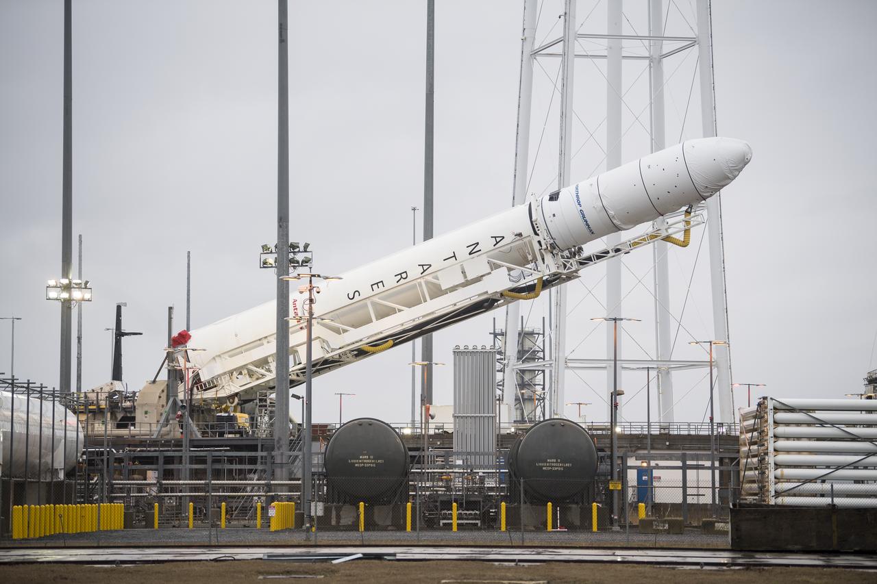 A Northrop Grumman Antares rocket carrying a Cygnus resupply spacecraft is raised into a vertical position on Pad-0A, Wednesday, Feb. 5, 2020, at NASA's Wallops Flight Facility in Virginia. Northrop Grumman’s 13th contracted cargo resupply mission with NASA to the International Space Station will deliver about 8,000 pounds of science and research, crew supplies and vehicle hardware to the orbital laboratory and its crew. The CRS-13 Cygnus spacecraft is named after the first African American astronaut, Major Robert Henry Lawrence Jr., and is scheduled to launch at 5:39pm EST Sunday, Feb. 9. Photo Credit: (NASA/Aubrey Gemignani)