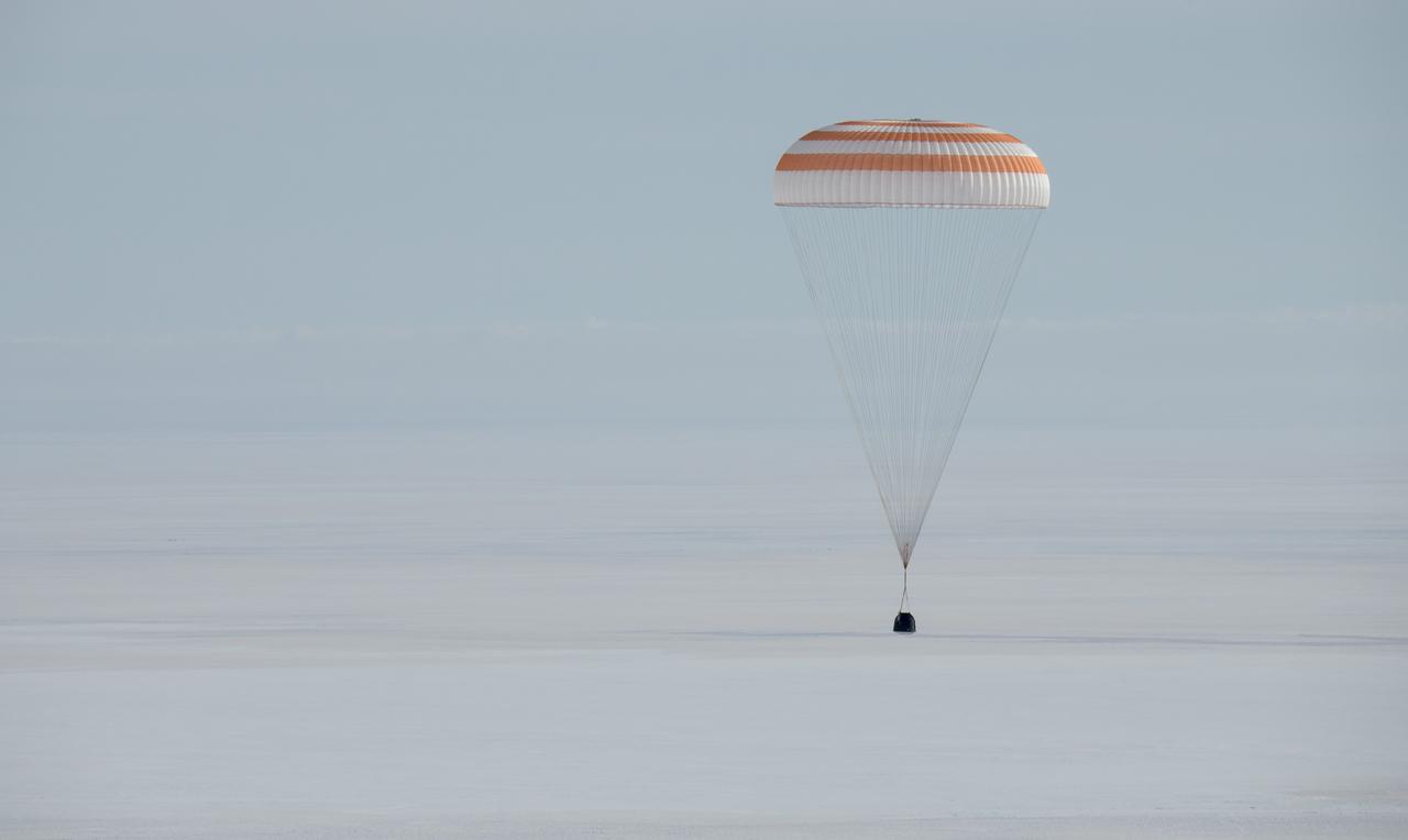 The Soyuz MS-13 spacecraft is seen as it lands in a remote area near the town of Zhezkazgan, Kazakhstan with Expedition 61 crew members Christina Koch of NASA, Alexander Skvortsov of the Russian space agency Roscosmos, and Luca Parmitano of ESA (European Space Agency) Thursday, Feb. 6, 2020. Koch returned to Earth after logging 328 days in space --- the longest spaceflight in history by a woman --- as a member of Expeditions 59-60-61 on the International Space Station. Skvortsov and Parmitano returned after 201 days in space where they served as Expedition 60-61 crew members onboard the station. Photo Credit: (NASA/Bill Ingalls)