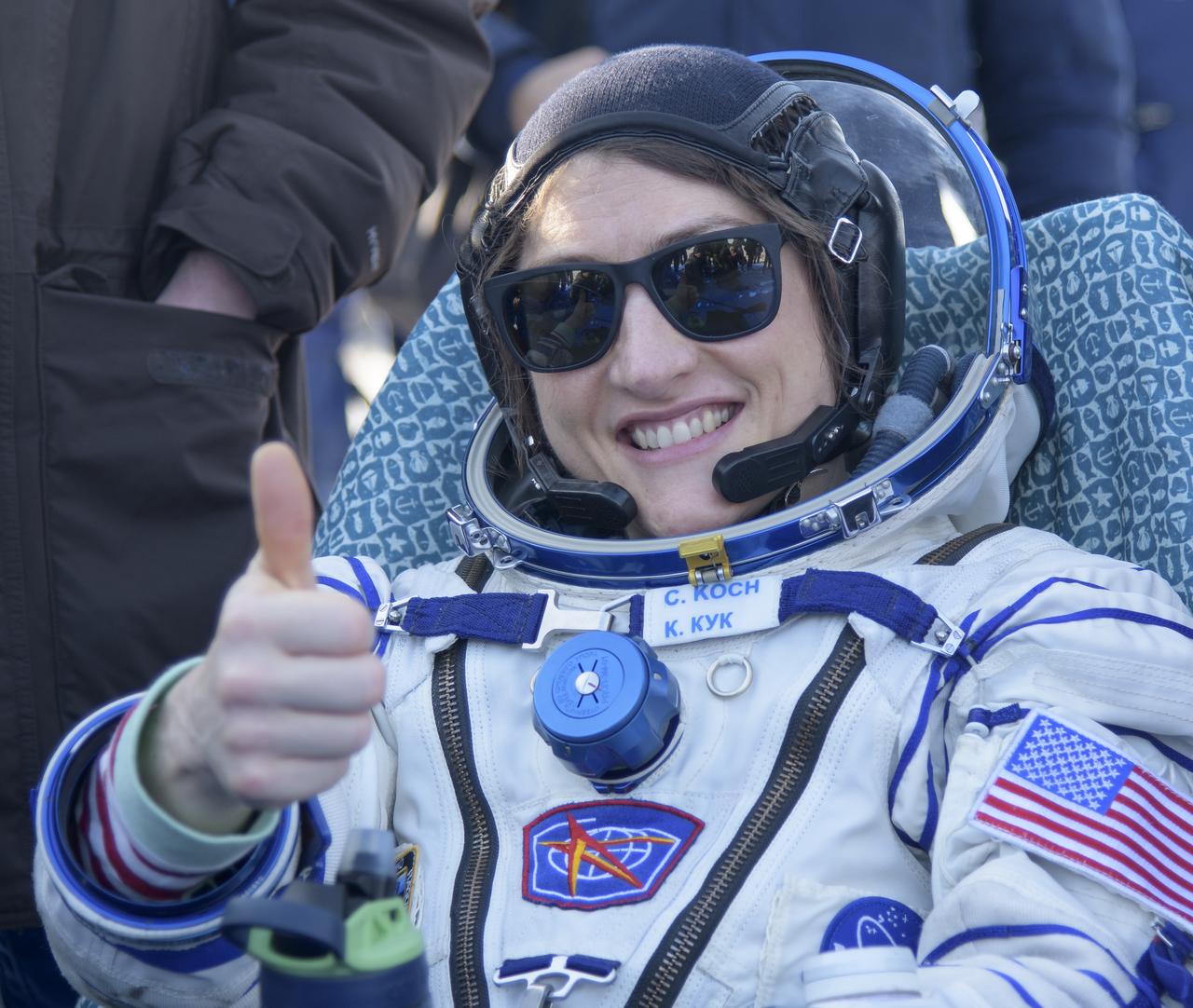 NASA astronaut Christina Koch is seen outside the Soyuz MS-13 spacecraft after she, Roscosmos cosmonaut Alexander Skvortsov, and ESA astronaut Luca Parmitano landed in a remote area near the town of Zhezkazgan, Kazakhstan on Thursday, Feb. 6, 2020. Koch returned to Earth after logging 328 days in space --- the longest spaceflight in history by a woman --- as a member of Expeditions 59-60-61 on the International Space Station. Skvortsov and Parmitano returned after 201 days in space where they served as Expedition 60-61 crew members onboard the station. Photo Credit: (NASA/Bill Ingalls)