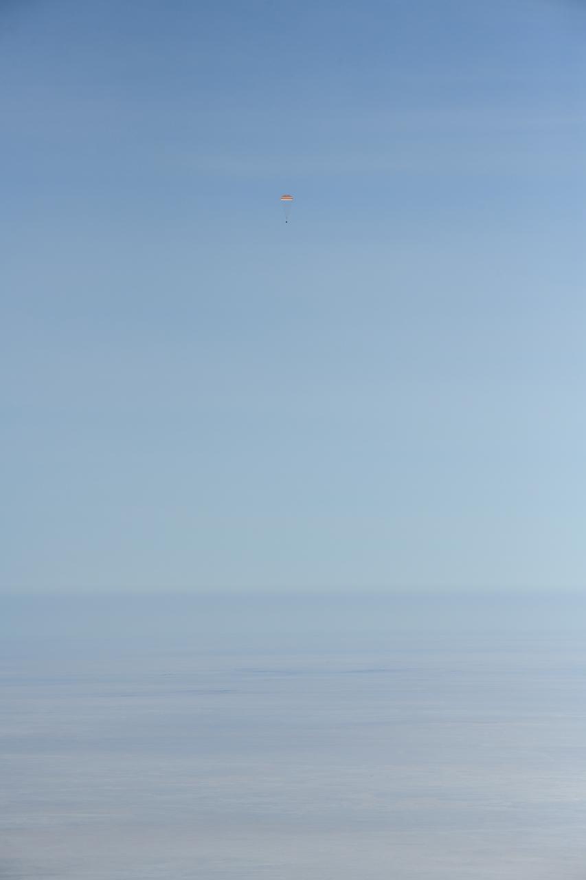 The Soyuz MS-13 spacecraft is seen as it lands in a remote area near the town of Zhezkazgan, Kazakhstan with Expedition 61 crew members Christina Koch of NASA, Alexander Skvortsov of the Russian space agency Roscosmos, and Luca Parmitano of ESA (European Space Agency) Thursday, Feb. 6, 2020. Koch returned to Earth after logging 328 days in space --- the longest spaceflight in history by a woman --- as a member of Expeditions 59-60-61 on the International Space Station. Skvortsov and Parmitano returned after 201 days in space where they served as Expedition 60-61 crew members onboard the station. Photo Credit: (NASA/Bill Ingalls)