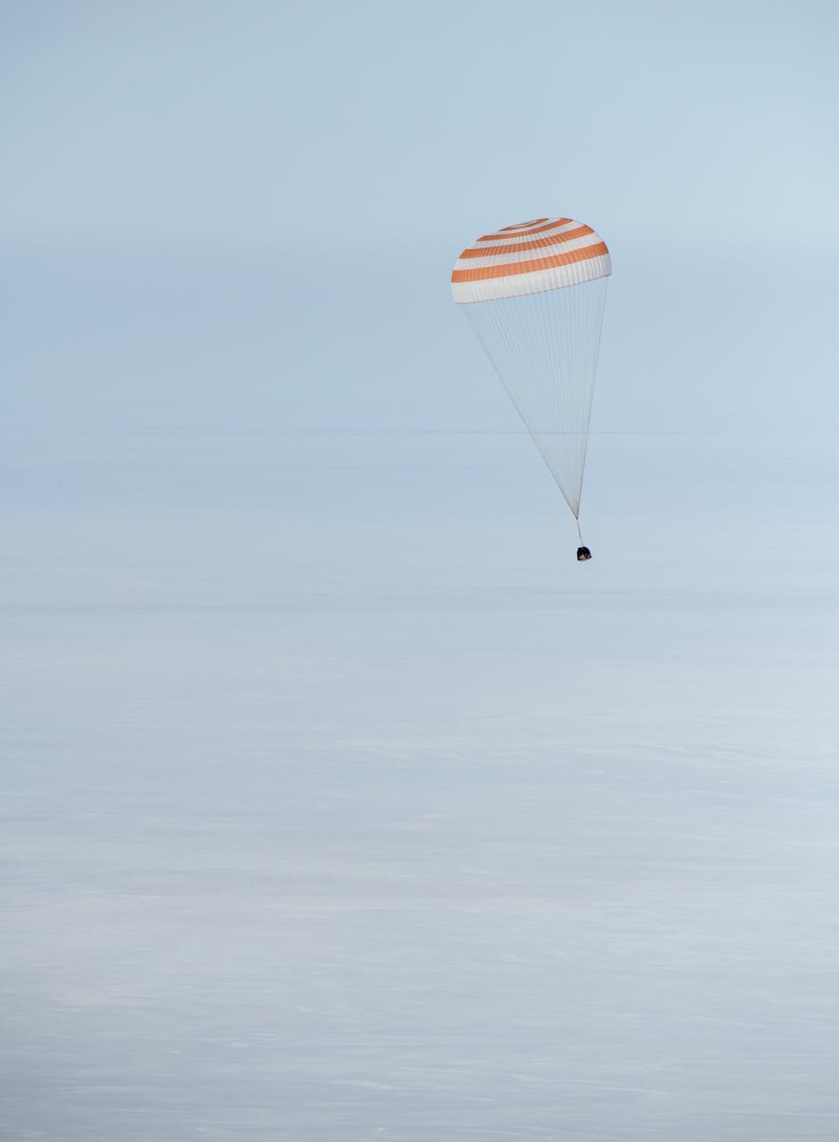 The Soyuz MS-13 spacecraft is seen as it lands in a remote area near the town of Zhezkazgan, Kazakhstan with Expedition 61 crew members Christina Koch of NASA, Alexander Skvortsov of the Russian space agency Roscosmos, and Luca Parmitano of ESA (European Space Agency) Thursday, Feb. 6, 2020. Koch returned to Earth after logging 328 days in space --- the longest spaceflight in history by a woman --- as a member of Expeditions 59-60-61 on the International Space Station. Skvortsov and Parmitano returned after 201 days in space where they served as Expedition 60-61 crew members onboard the station. Photo Credit: (NASA/Bill Ingalls)
