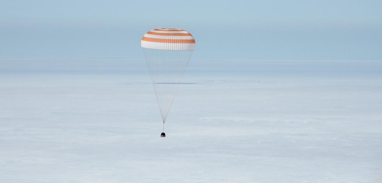 The Soyuz MS-13 spacecraft is seen as it lands in a remote area near the town of Zhezkazgan, Kazakhstan with Expedition 61 crew members Christina Koch of NASA, Alexander Skvortsov of the Russian space agency Roscosmos, and Luca Parmitano of ESA (European Space Agency) Thursday, Feb. 6, 2020. Koch returned to Earth after logging 328 days in space --- the longest spaceflight in history by a woman --- as a member of Expeditions 59-60-61 on the International Space Station. Skvortsov and Parmitano returned after 201 days in space where they served as Expedition 60-61 crew members onboard the station. Photo Credit: (NASA/Bill Ingalls)