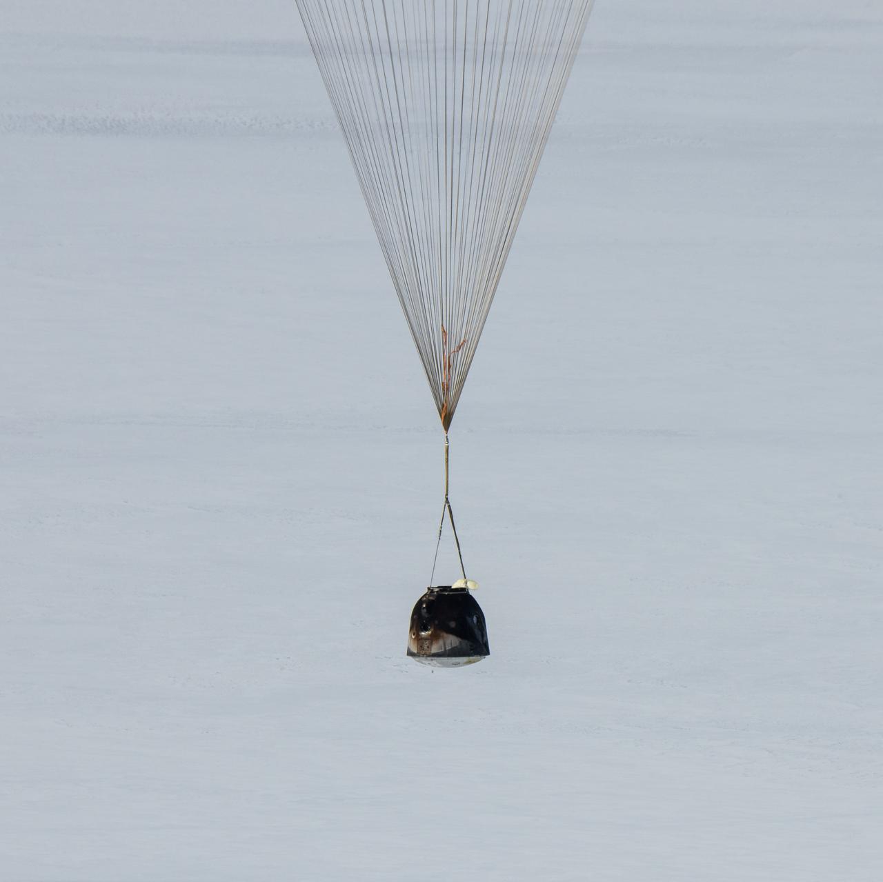 The Soyuz MS-13 spacecraft is seen as it lands in a remote area near the town of Zhezkazgan, Kazakhstan with Expedition 61 crew members Christina Koch of NASA, Alexander Skvortsov of the Russian space agency Roscosmos, and Luca Parmitano of ESA (European Space Agency) Thursday, Feb. 6, 2020. Koch returned to Earth after logging 328 days in space --- the longest spaceflight in history by a woman --- as a member of Expeditions 59-60-61 on the International Space Station. Skvortsov and Parmitano returned after 201 days in space where they served as Expedition 60-61 crew members onboard the station. Photo Credit: (NASA/Bill Ingalls)