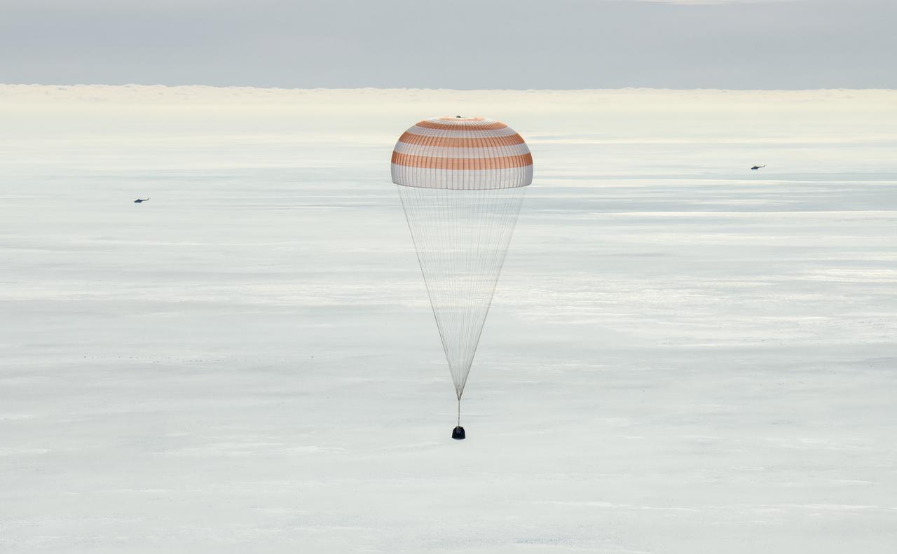 The Soyuz MS-13 spacecraft is seen as it lands in a remote area near the town of Zhezkazgan, Kazakhstan with Expedition 61 crew members Christina Koch of NASA, Alexander Skvortsov of the Russian space agency Roscosmos, and Luca Parmitano of ESA (European Space Agency) Thursday, Feb. 6, 2020. Koch returned to Earth after logging 328 days in space --- the longest spaceflight in history by a woman --- as a member of Expeditions 59-60-61 on the International Space Station. Skvortsov and Parmitano returned after 201 days in space where they served as Expedition 60-61 crew members onboard the station. Photo Credit: (NASA/Bill Ingalls)
