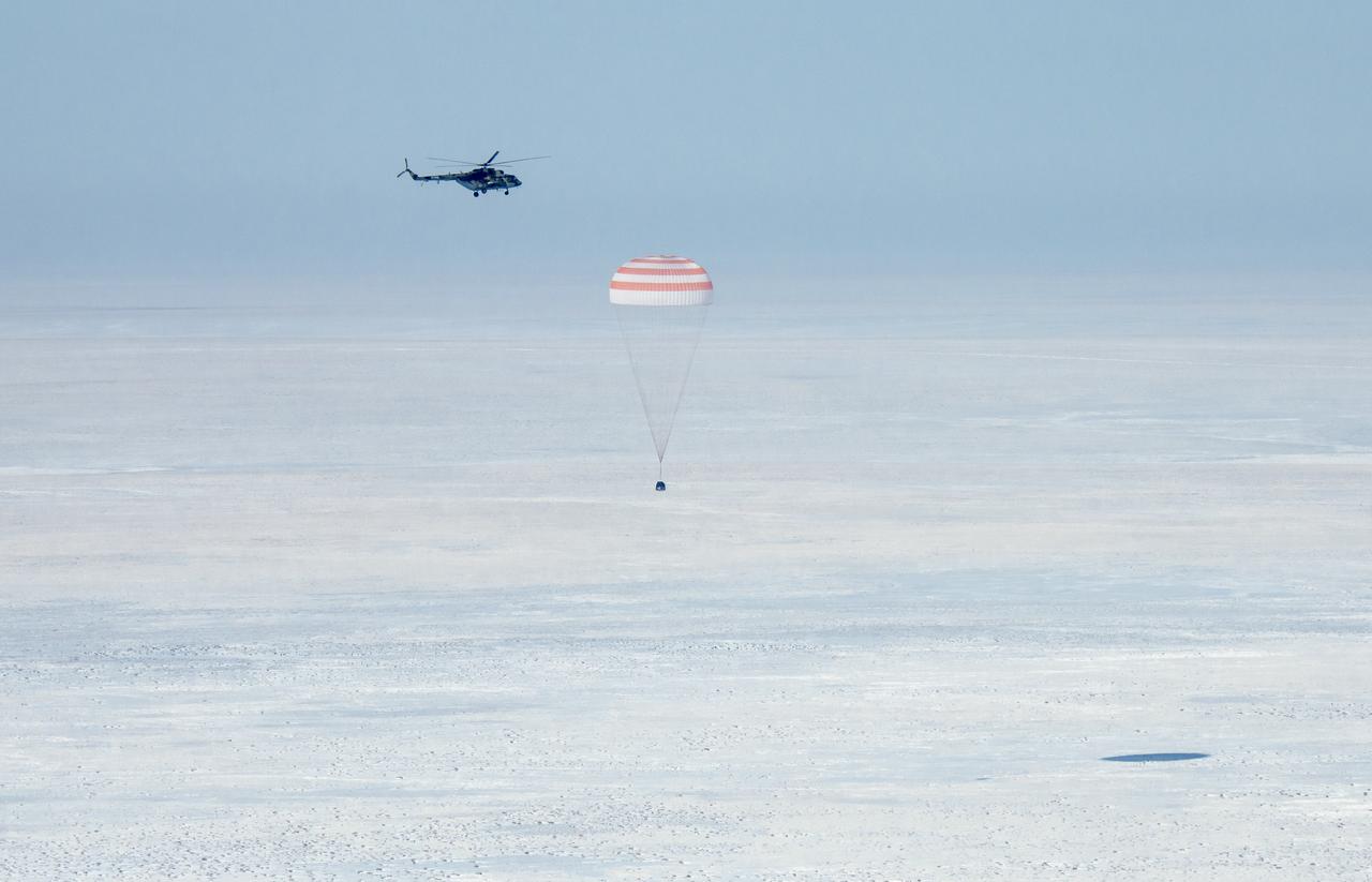 The Soyuz MS-13 spacecraft is seen as it lands in a remote area near the town of Zhezkazgan, Kazakhstan with Expedition 61 crew members Christina Koch of NASA, Alexander Skvortsov of the Russian space agency Roscosmos, and Luca Parmitano of ESA (European Space Agency) Thursday, Feb. 6, 2020. Koch returned to Earth after logging 328 days in space --- the longest spaceflight in history by a woman --- as a member of Expeditions 59-60-61 on the International Space Station. Skvortsov and Parmitano returned after 201 days in space where they served as Expedition 60-61 crew members onboard the station. Photo Credit: (NASA/Bill Ingalls)