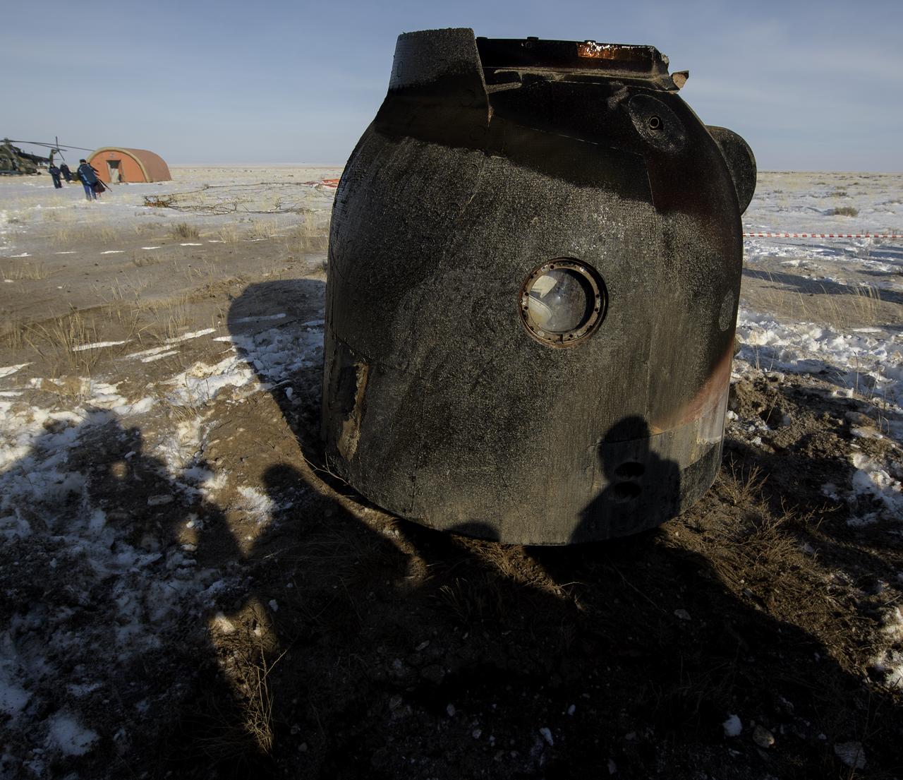 Russian Search and Rescue teams arrive at the Soyuz MS-13 spacecraft shortly after it landed in a remote area near the town of Zhezkazgan, Kazakhstan with Expedition 61 crew members Christina Koch of NASA, Alexander Skvortsov of the Russian space agency Roscosmos, and Luca Parmitano of ESA (European Space Agency) Thursday, Feb. 6, 2020. Koch returned to Earth after logging 328 days in space --- the longest spaceflight in history by a woman --- as a member of Expeditions 59-60-61 on the International Space Station. Skvortsov and Parmitano returned after 201 days in space where they served as Expedition 60-61 crew members onboard the station. Photo Credit: (NASA/Bill Ingalls)