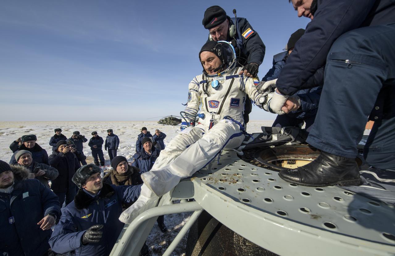 Roscosmos cosmonaut Alexander Skvortsov is helped out of the Soyuz MS-13 spacecraft just minutes after he, NASA astronaut Christina Koch, and ESA astronaut Luca Parmitano landed in a remote area near the town of Zhezkazgan, Kazakhstan on Thursday, Feb. 6, 2020. Koch returned to Earth after logging 328 days in space --- the longest spaceflight in history by a woman --- as a member of Expeditions 59-60-61 on the International Space Station. Skvortsov and Parmitano returned after 201 days in space where they served as Expedition 60-61 crew members onboard the station. Photo Credit: (NASA/Bill Ingalls)