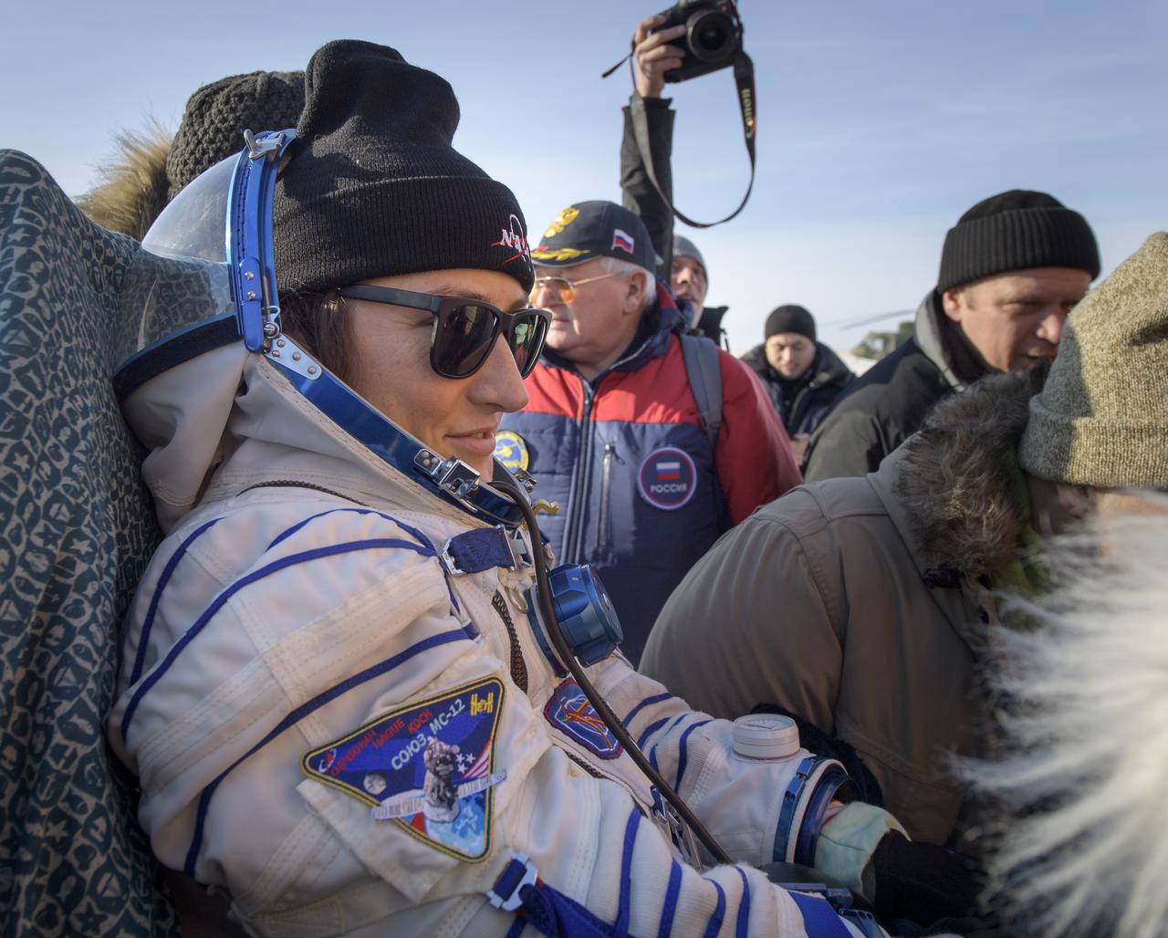 NASA astronaut Christina Koch is carried to a medical tent shortly after she, ESA astronaut Luca Parmitano, and Roscosmos cosmonaut Alexander Skvortsov landed in their Soyuz MS-13 spacecraft near the town of Zhezkazgan, Kazakhstan on Thursday, Feb. 6, 2020. Koch returned to Earth after logging 328 days in space --- the longest spaceflight in history by a woman --- as a member of Expeditions 59-60-61 on the International Space Station. Skvortsov and Parmitano returned after 201 days in space where they served as Expedition 60-61 crew members onboard the station. Photo Credit: (NASA/Bill Ingalls)