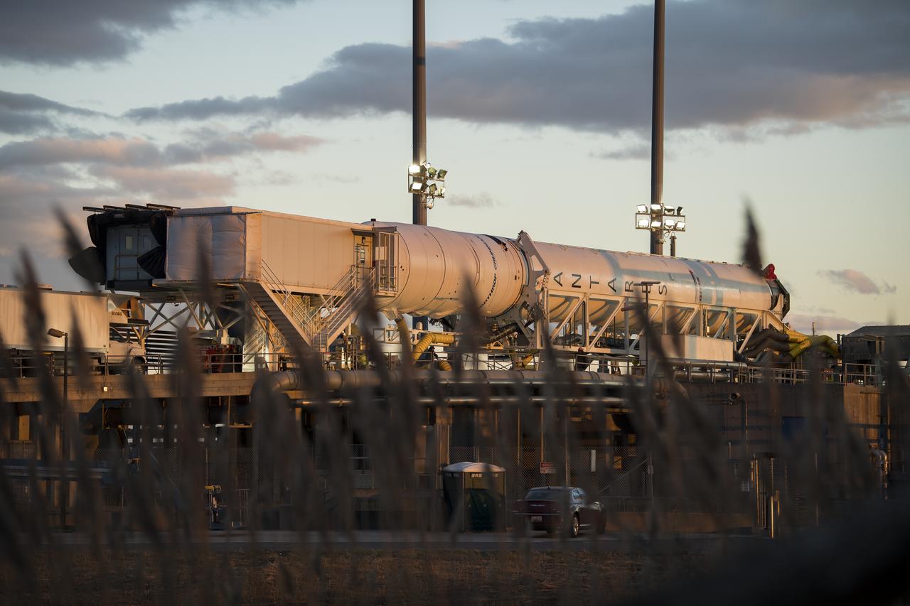 A Northrop Grumman Antares rocket carrying a Cygnus resupply spacecraft is horizontal for the final cargo load on Pad-0A, Friday, Feb. 7, 2020 at NASA's Wallops Flight Facility in Virginia. Northrop Grumman’s 13th contracted cargo resupply mission with NASA to the International Space Station will deliver more than 7,500 pounds of science and research, crew supplies and vehicle hardware to the orbital laboratory and its crew. Photo Credit: (NASA/Aubrey Gemignani)