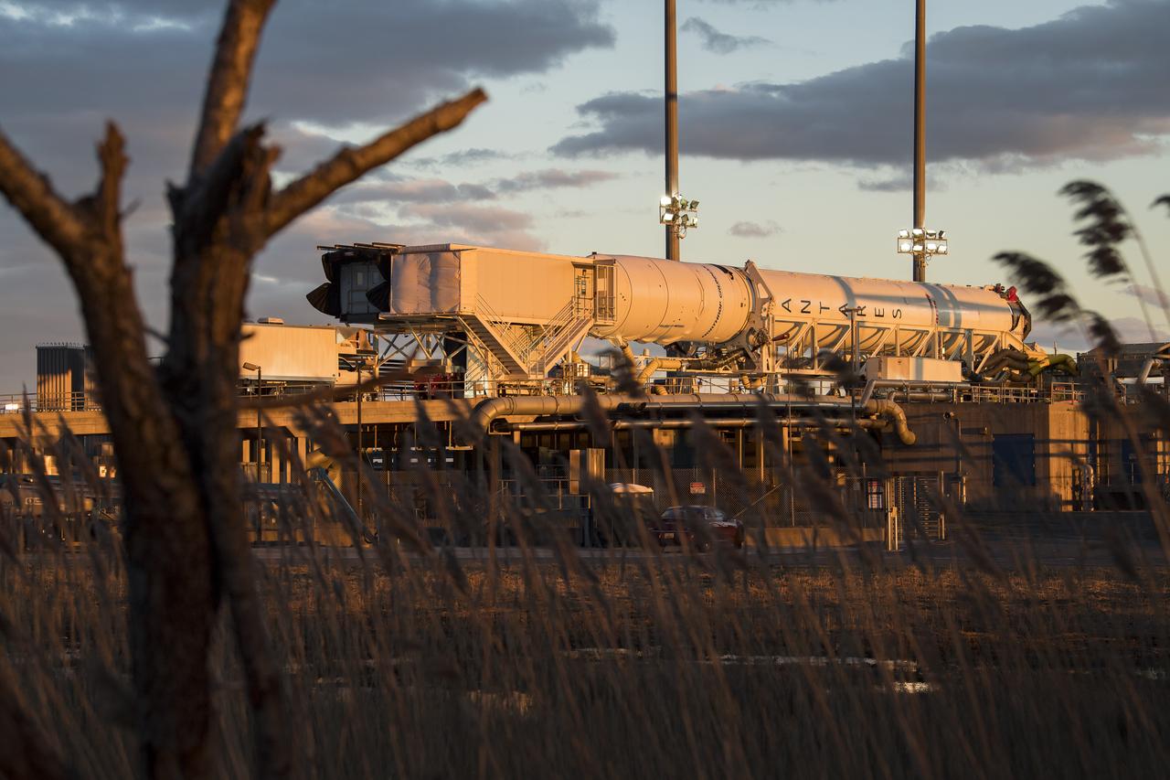 A Northrop Grumman Antares rocket carrying a Cygnus resupply spacecraft is horizontal for the final cargo load on Pad-0A, Friday, Feb. 7, 2020 at NASA's Wallops Flight Facility in Virginia. Northrop Grumman’s 13th contracted cargo resupply mission with NASA to the International Space Station will deliver more than 7,500 pounds of science and research, crew supplies and vehicle hardware to the orbital laboratory and its crew. Photo Credit: (NASA/Aubrey Gemignani)