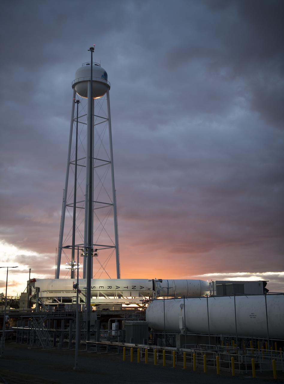 A Northrop Grumman Antares rocket carrying a Cygnus resupply spacecraft is horizontal for the final cargo load on Pad-0A, Friday, Feb. 7, 2020 at NASA's Wallops Flight Facility in Virginia. Northrop Grumman’s 13th contracted cargo resupply mission with NASA to the International Space Station will deliver more than 7,500 pounds of science and research, crew supplies and vehicle hardware to the orbital laboratory and its crew. Photo Credit: (NASA/Aubrey Gemignani)