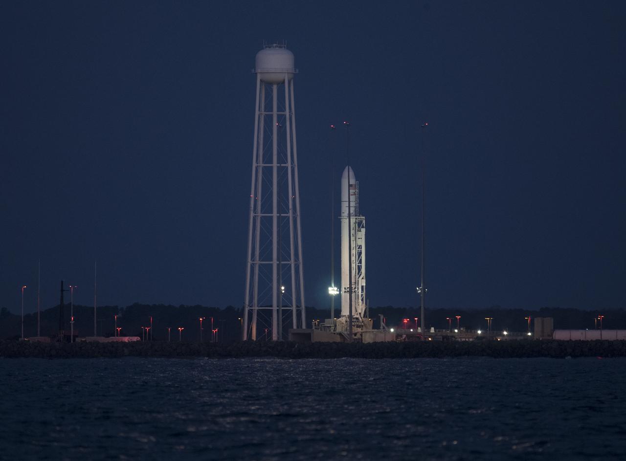 A Northrop Grumman Antares rocket carrying a Cygnus resupply spacecraft is seen early in the morning on Pad-0A, Sunday, Feb. 9, 2020, at NASA's Wallops Flight Facility in Virginia. Northrop Grumman’s 13th contracted cargo resupply mission with NASA to the International Space Station will deliver more than 7,500 pounds of science and research, crew supplies and vehicle hardware to the orbital laboratory and its crew. The CRS-13 Cygnus spacecraft is named after the first African American astronaut, Major Robert Henry Lawrence Jr.. Photo Credit: (NASA/Aubrey Gemignani)