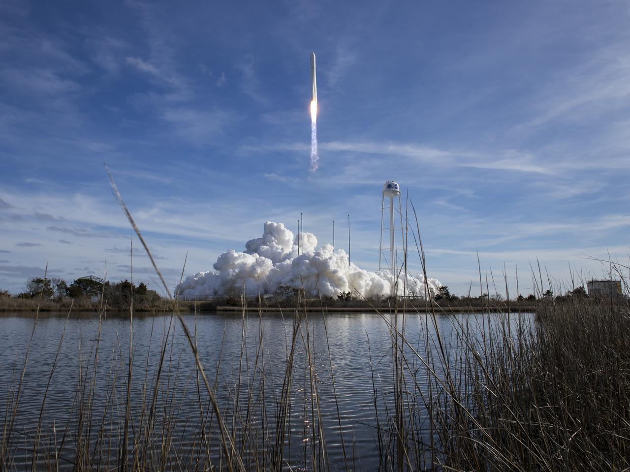 The Northrop Grumman Antares rocket, with Cygnus resupply spacecraft onboard, launches from Pad-0A, Saturday, Feb. 15, 2020 at NASA's Wallops Flight Facility in Virginia. Northrop Grumman's 13th contracted cargo resupply mission for NASA to the International Space Station will deliver more than 7,500 pounds of science and research, crew supplies and vehicle hardware to the orbital laboratory and its crew. Photo Credit: (NASA/Aubrey Gemignani)