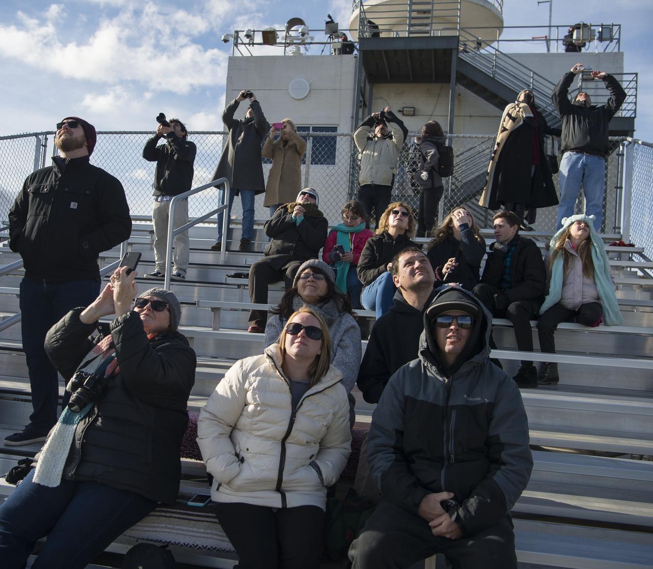 Mid-Atlantic Regional Spaceport (MARS) staff, their families, and other visitors watch the launch of the Northrop Grumman Antares rocket, with Cygnus resupply spacecraft onboard, Saturday, Feb. 15, 2020 at NASA's Wallops Flight Facility in Virginia. Northrop Grumman's 13th contracted cargo resupply mission for NASA to the International Space Station will deliver more than 7,500 pounds of science and research, crew supplies and vehicle hardware to the orbital laboratory and its crew. Photo Credit: (NASA/Aubrey Gemignani)