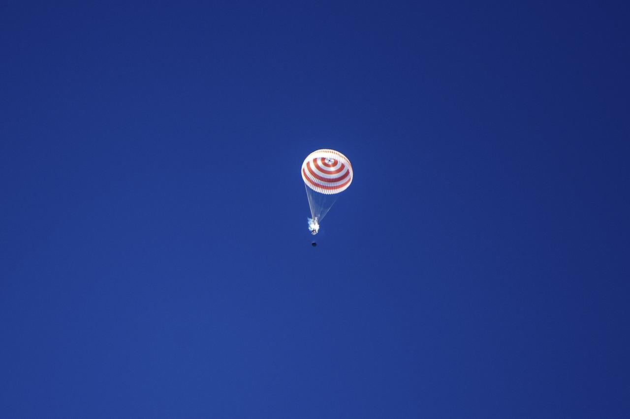 The Soyuz MS-15 spacecraft is seen as it lands in a remote area near the town of Zhezkazgan, Kazakhstan with Expedition 62 crew members Jessica Meir and Drew Morgan of NASA, and Oleg Skripochka of Roscosmos, Friday, April 17, 2020. Meir and Skripochka returned after 205 days in space, and Morgan after 272 days in space. All three served as Expedition 60-61-62 crew members onboard the International Space Station. Photo Credit: (NASA/GCTC/Andrey Shelepin)