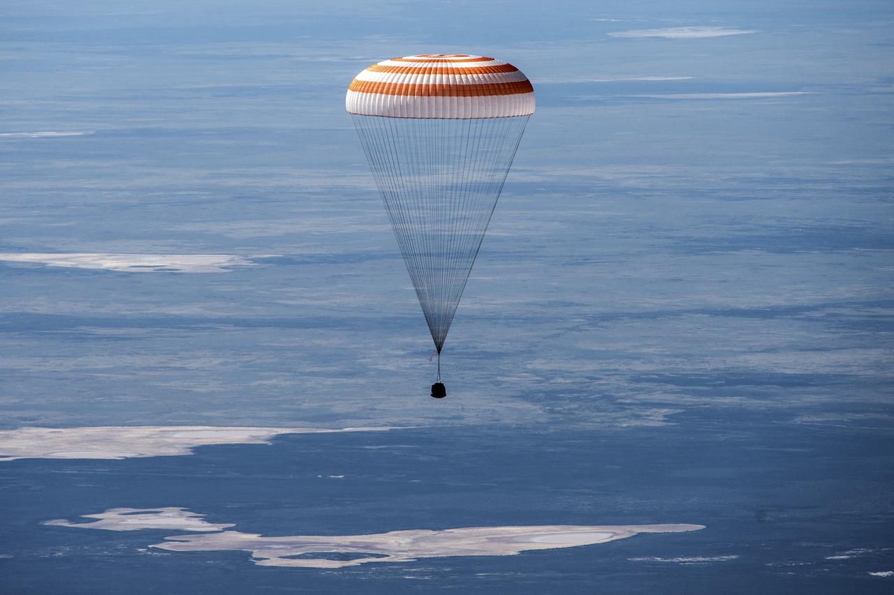 The Soyuz MS-15 spacecraft is seen as it lands in a remote area near the town of Zhezkazgan, Kazakhstan with Expedition 62 crew members Jessica Meir and Drew Morgan of NASA, and Oleg Skripochka of Roscosmos, Friday, April 17, 2020. Meir and Skripochka returned after 205 days in space, and Morgan after 272 days in space. All three served as Expedition 60-61-62 crew members onboard the International Space Station. Photo Credit: (NASA/GCTC/Andrey Shelepin)