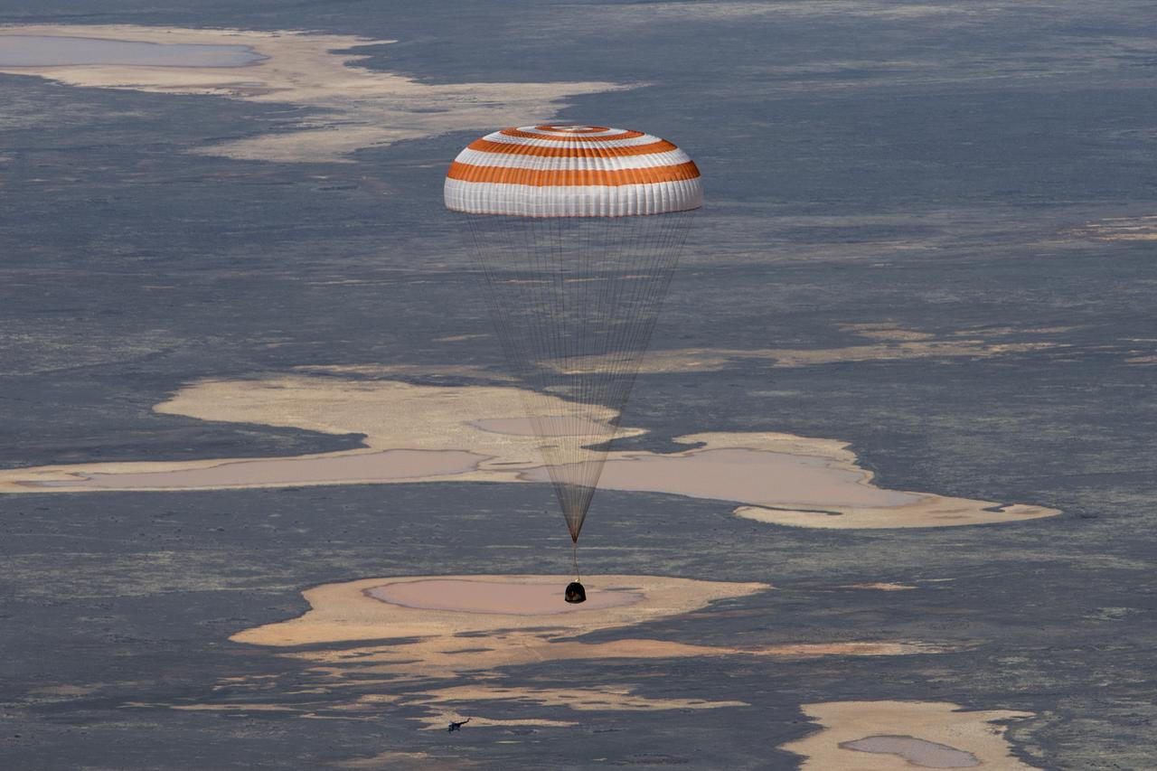 The Soyuz MS-15 spacecraft is seen as it lands in a remote area near the town of Zhezkazgan, Kazakhstan with Expedition 62 crew members Jessica Meir and Drew Morgan of NASA, and Oleg Skripochka of Roscosmos, Friday, April 17, 2020. Meir and Skripochka returned after 205 days in space, and Morgan after 272 days in space. All three served as Expedition 60-61-62 crew members onboard the International Space Station. Photo Credit: (NASA/GCTC/Andrey Shelepin)