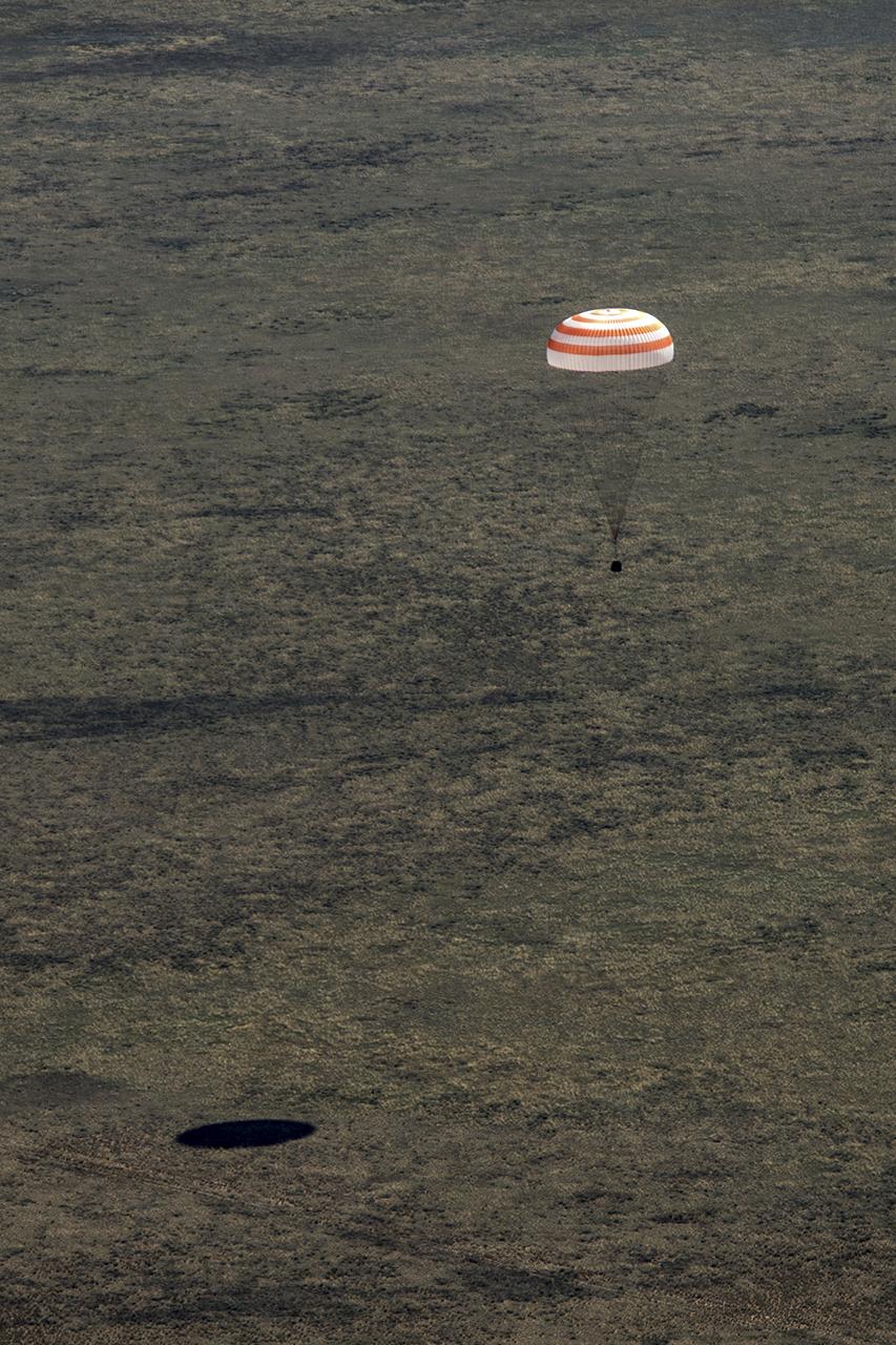 The Soyuz MS-15 spacecraft is seen as it lands in a remote area near the town of Zhezkazgan, Kazakhstan with Expedition 62 crew members Jessica Meir and Drew Morgan of NASA, and Oleg Skripochka of Roscosmos, Friday, April 17, 2020. Meir and Skripochka returned after 205 days in space, and Morgan after 272 days in space. All three served as Expedition 60-61-62 crew members onboard the International Space Station. Photo Credit: (NASA/GCTC/Andrey Shelepin)