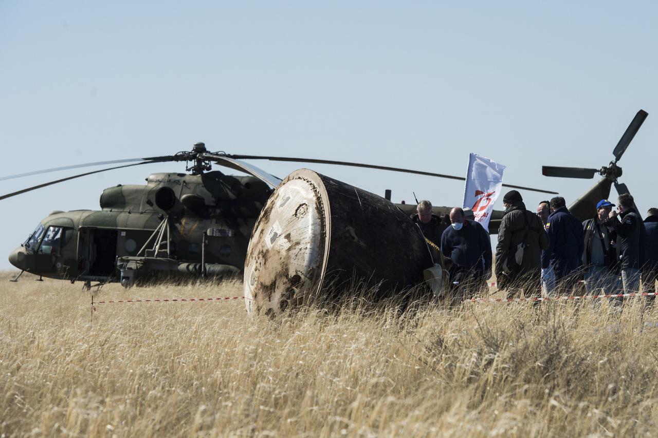 Russian Search and Rescue teams arrive at the Soyuz MS-15 spacecraft shortly after it landed in a remote area near the town of Zhezkazgan, Kazakhstan with Expedition 62 crew members Jessica Meir and Drew Morgan of NASA, and Oleg Skripochka of Roscosmos, Friday, April 17, 2020. Meir and Skripochka returned after 205 days in space, and Morgan after 272 days in space. All three served as Expedition 60-61-62 crew members onboard the International Space Station. Photo Credit: (NASA/GCTC/Andrey Shelepin)