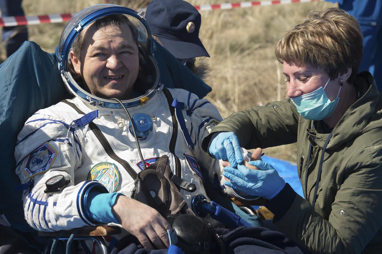 Expedition 62 cosmonaut Oleg Skripochka is seen outside the Soyuz MS-15 spacecraft after he landed with NASA astronauts Andrew Morgan and Jessica Meir in a remote area near the town of Zhezkazgan, Kazakhstan on Friday, April 17, 2020. Meir and Skripochka returned after 205 days in space, and Morgan after 272 days in space. All three served as Expedition 60-61-62 crew members onboard the International Space Station. Photo Credit: (NASA/GCTC/Andrey Shelepin)