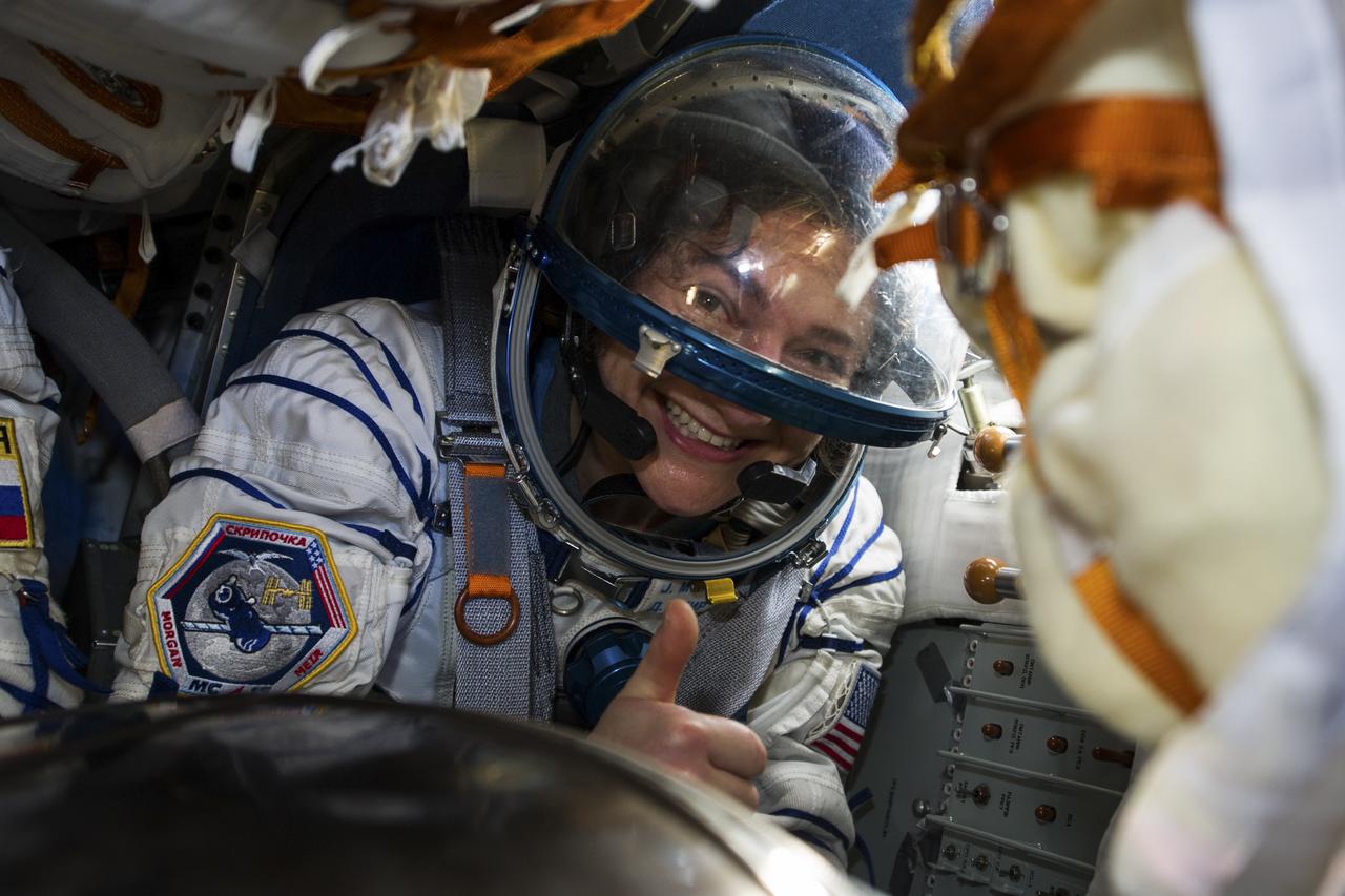 Expedition 62 crew member Jessica Meir of NASA gives a thumbs up after she, Roscosmos cosmonaut Oleg Skripochka, and NASA astronaut Andrew Morgan landed in their Soyuz MS-15 spacecraft in a remote area near the town of Zhezkazgan, Kazakhstan on Friday, April 17, 2020. Meir and Skripochka returned after 205 days in space, and Morgan after 272 days in space. All three served as Expedition 60-61-62 crew members onboard the International Space Station. Photo Credit: (NASA/GCTC/Andrey Shelepin)