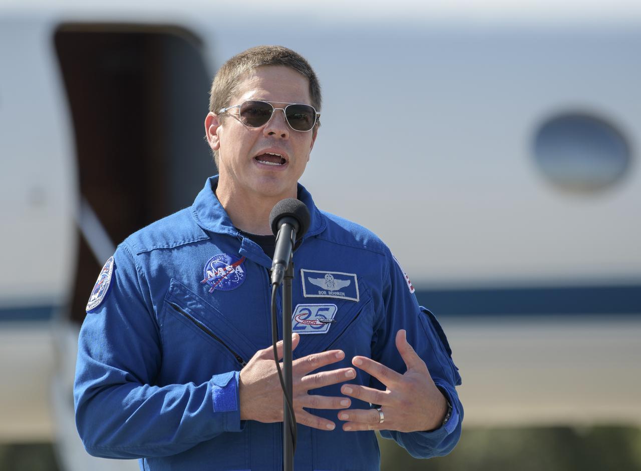 NASA astronaut Robert Behnken speaks to members of the media after he and NASA astronaut Douglas Hurley arrived at the Launch and Landing Facility at NASA’s Kennedy Space Center ahead of SpaceX’s Demo-2 mission, Wednesday, May 20, 2020, in Florida. NASA’s SpaceX Demo-2 mission is the first launch with astronauts of the SpaceX Crew Dragon spacecraft and Falcon 9 rocket to the International Space Station as part of the agency’s Commercial Crew Program. The flight test will serve as an end-to-end demonstration of SpaceX’s crew transportation system. Behnken and Hurley are scheduled to launch at 4:33 p.m. EDT on Wednesday, May 27, from Launch Complex 39A at the Kennedy Space Center. A new era of human spaceflight is set to begin as American astronauts once again launch on an American rocket from American soil to low-Earth orbit for the first time since the conclusion of the Space Shuttle Program in 2011.  Photo Credit: (NASA/Bill Ingalls)