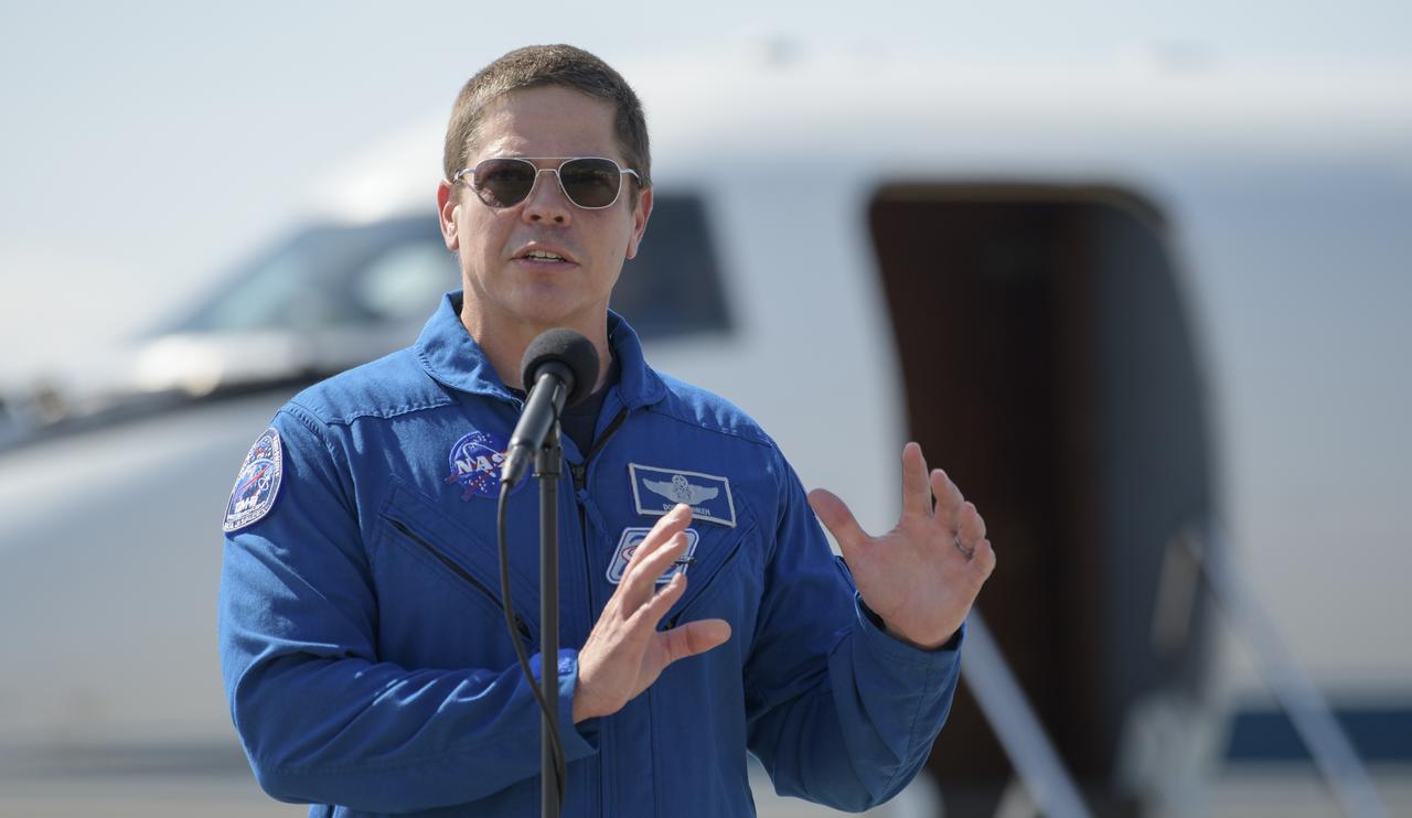 NASA astronaut Robert Behnken speaks to members of the media after he and NASA astronaut Douglas Hurley arrived at the Launch and Landing Facility at NASA’s Kennedy Space Center ahead of SpaceX’s Demo-2 mission, Wednesday, May 20, 2020, in Florida. NASA’s SpaceX Demo-2 mission is the first launch with astronauts of the SpaceX Crew Dragon spacecraft and Falcon 9 rocket to the International Space Station as part of the agency’s Commercial Crew Program. The flight test will serve as an end-to-end demonstration of SpaceX’s crew transportation system. Behnken and Hurley are scheduled to launch at 4:33 p.m. EDT on Wednesday, May 27, from Launch Complex 39A at the Kennedy Space Center. A new era of human spaceflight is set to begin as American astronauts once again launch on an American rocket from American soil to low-Earth orbit for the first time since the conclusion of the Space Shuttle Program in 2011.  Photo Credit: (NASA/Bill Ingalls)