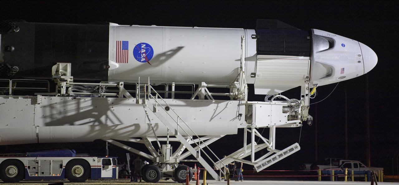 A SpaceX Falcon 9 rocket with the company's Crew Dragon spacecraft onboard is seen as it is rolled out of the horizontal integration facility at Launch Complex 39A as preparations continue for the Demo-2 mission, Thursday, May 21, 2020, at NASA’s Kennedy Space Center in Florida. NASA’s SpaceX Demo-2 mission is the first launch with astronauts of the SpaceX Crew Dragon spacecraft and Falcon 9 rocket to the International Space Station as part of the agency’s Commercial Crew Program. The flight test will serve as an end-to-end demonstration of SpaceX’s crew transportation system. Behnken and Hurley are scheduled to launch at 4:33 p.m. EDT on Wednesday, May 27, from Launch Complex 39A at the Kennedy Space Center. A new era of human spaceflight is set to begin as American astronauts once again launch on an American rocket from American soil to low-Earth orbit for the first time since the conclusion of the Space Shuttle Program in 2011. Photo Credit: (NASA/Bill Ingalls)