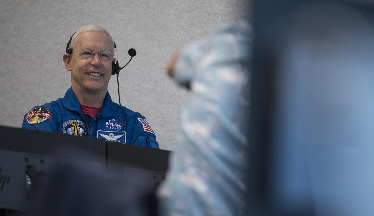 Pat Forrester, NASA’s chief of the astronaut office, is seen in firing room four during a dress rehearsal in preparation for the launch of a SpaceX Falcon 9 rocket carrying the company's Crew Dragon spacecraft on NASA’s SpaceX Demo-2 mission with NASA astronauts Robert Behnken and Douglas Hurley onboard, Saturday, May 23, 2020, Launch Control Center at NASA’s Kennedy Space Center in Florida. NASA’s SpaceX Demo-2 mission is the first launch with astronauts of the SpaceX Crew Dragon spacecraft and Falcon 9 rocket to the International Space Station as part of the agency’s Commercial Crew Program. The test flight serves as an end-to-end demonstration of SpaceX’s crew transportation system. Behnken and Hurley are scheduled to launch at 4:33 p.m. EDT on Wednesday, May 27, from Launch Complex 39A at the Kennedy Space Center. A new era of human spaceflight is set to begin as American astronauts once again launch on an American rocket from American soil to low-Earth orbit for the first time since the conclusion of the Space Shuttle Program in 2011. Photo Credit: (NASA/Joel Kowsky)