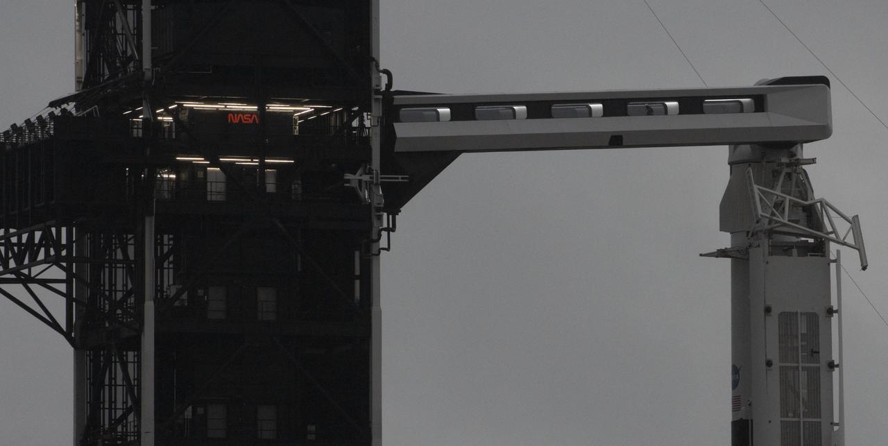 A SpaceX Falcon 9 rocket with the company's Crew Dragon spacecraft onboard is seen on the launch pad at Launch Complex 39A as preparations continue for the Demo-2 mission, Monday, May 25, 2020, at NASA’s Kennedy Space Center in Florida. NASA’s SpaceX Demo-2 mission is the first launch with astronauts of the SpaceX Crew Dragon spacecraft and Falcon 9 rocket to the International Space Station as part of the agency’s Commercial Crew Program. The test flight serves as an end-to-end demonstration of SpaceX’s crew transportation system. Robert Behnken and Douglas Hurley are scheduled to launch at 4:33 p.m. EDT on Wednesday, May 27, from Launch Complex 39A at the Kennedy Space Center. A new era of human spaceflight is set to begin as American astronauts once again launch on an American rocket from American soil to low-Earth orbit for the first time since the conclusion of the Space Shuttle Program in 2011. Photo Credit: (NASA/Joel Kowsky)