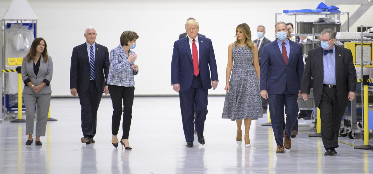 President Donald Trump, First Lady Melania Trump, Vice President Mike Pence, Second Lady Karen Pence, Marillyn Hewson, Chief Executive Officer, Lockheed Martin, NASA Administrator Jim Bridenstine, Kennedy Space Center Director Bob Cabana and Mike Hawes, VP and Orion Program Manager, Lockheed Martin, are seen during a tour of the Neil A. Armstrong Operations and Checkout Building following the departure of NASA astronauts Robert Behnken and Douglas Hurley for Launch Complex 39A to board a SpaceX Crew Dragon spacecraft for launch, Wednesday, May 27, 2020, at NASA’s Kennedy Space Center in Florida. NASA’s SpaceX Demo-2 mission is the first launch with astronauts of the SpaceX Crew Dragon spacecraft and Falcon 9 rocket to the International Space Station as part of the agency’s Commercial Crew Program. The flight test will serve as an end-to-end demonstration of SpaceX’s crew transportation system. Today’s launch of Behnken and Hurley was scrubbed due to weather and is now scheduled for 3:22 p.m. EDT on Saturday, May 30, from Launch Complex 39A at the Kennedy Space Center. A new era of human spaceflight is set to begin as American astronauts once again launch on an American rocket from American soil to low-Earth orbit for the first time since the conclusion of the Space Shuttle Program in 2011.  Photo Credit: (NASA/Bill Ingalls)