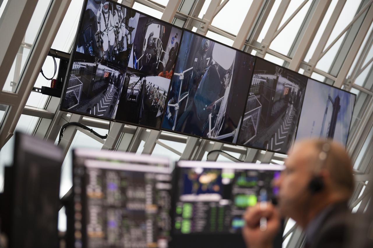 Monitors inside firing room four show views of Launch Complex 39A during the attempted launch of a SpaceX Falcon 9 rocket carrying the company's Crew Dragon spacecraft on NASA’s SpaceX Demo-2 mission with NASA astronauts Robert Behnken and Douglas Hurley onboard, Wednesday, May 27, 2020, in firing room four of the Launch Control Center at NASA’s Kennedy Space Center in Florida. NASA’s SpaceX Demo-2 mission is the first launch with astronauts of the SpaceX Crew Dragon spacecraft and Falcon 9 rocket to the International Space Station as part of the agency’s Commercial Crew Program. The test flight serves as an end-to-end demonstration of SpaceX’s crew transportation system. Today’s launch of Behnken and Hurley was scrubbed due to weather and is now scheduled for 3:22 p.m. EDT on Saturday, May 30, from Launch Complex 39A at the Kennedy Space Center. A new era of human spaceflight is set to begin as American astronauts once again launch on an American rocket from American soil to low-Earth orbit for the first time since the conclusion of the Space Shuttle Program in 2011. Photo Credit: (NASA/Joel Kowsky)